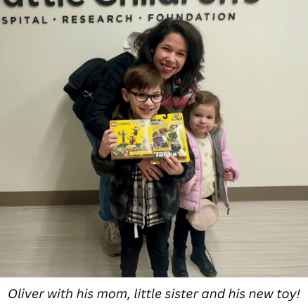 Oliver with his mom and little sister at Seattle Children's Hospital